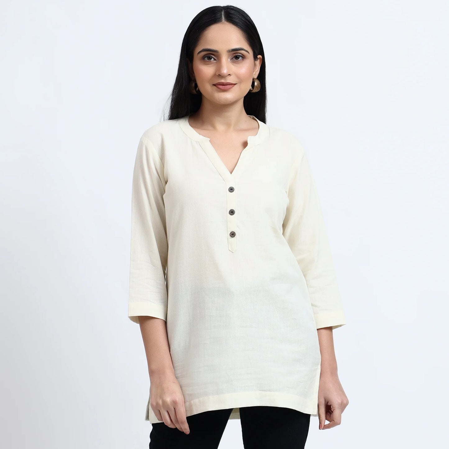 Ecru airy linen short kurta for women, featuring a stylish design and comfortable fit